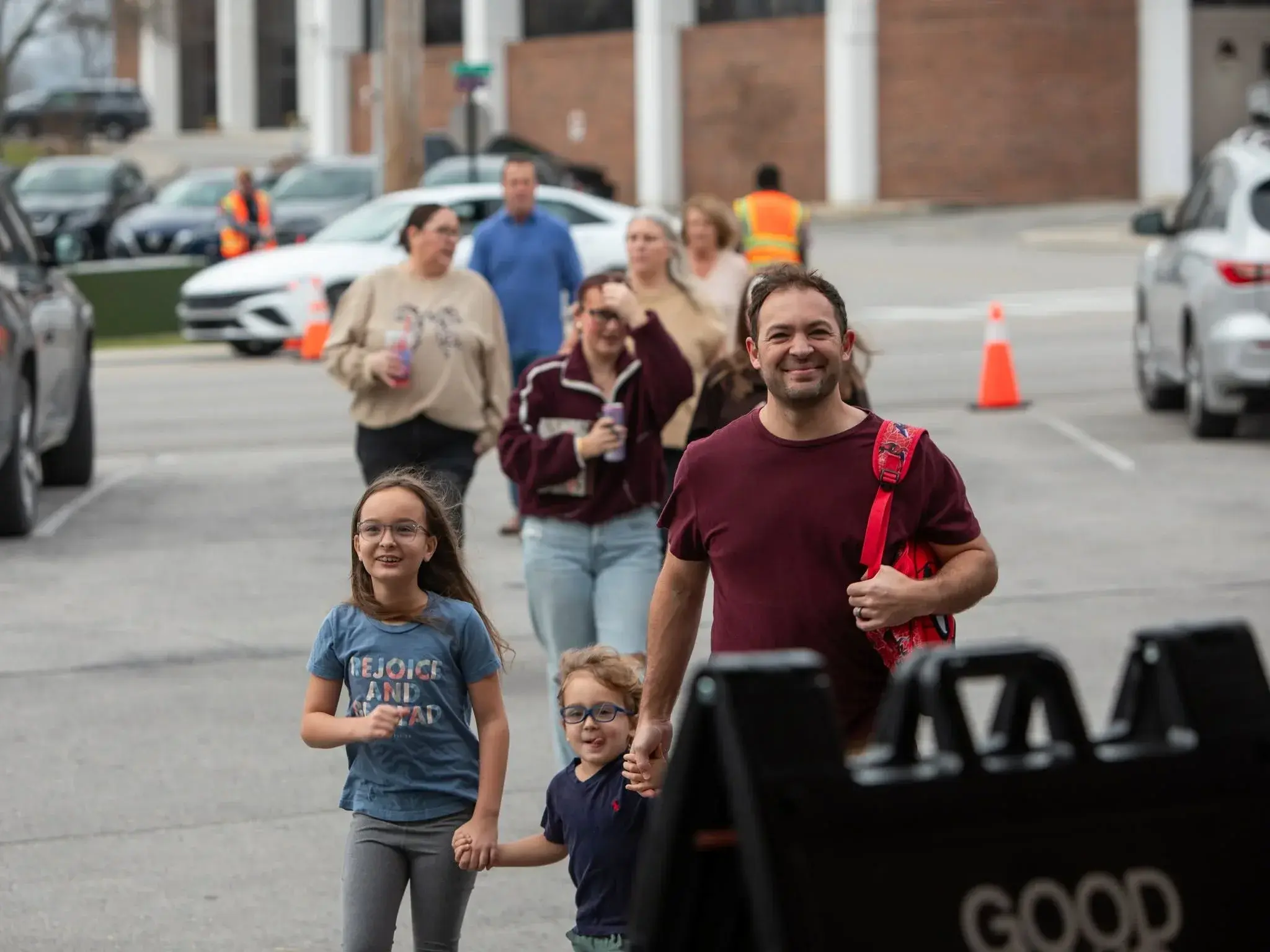 A family arriving at Good News Co. on Sunday.