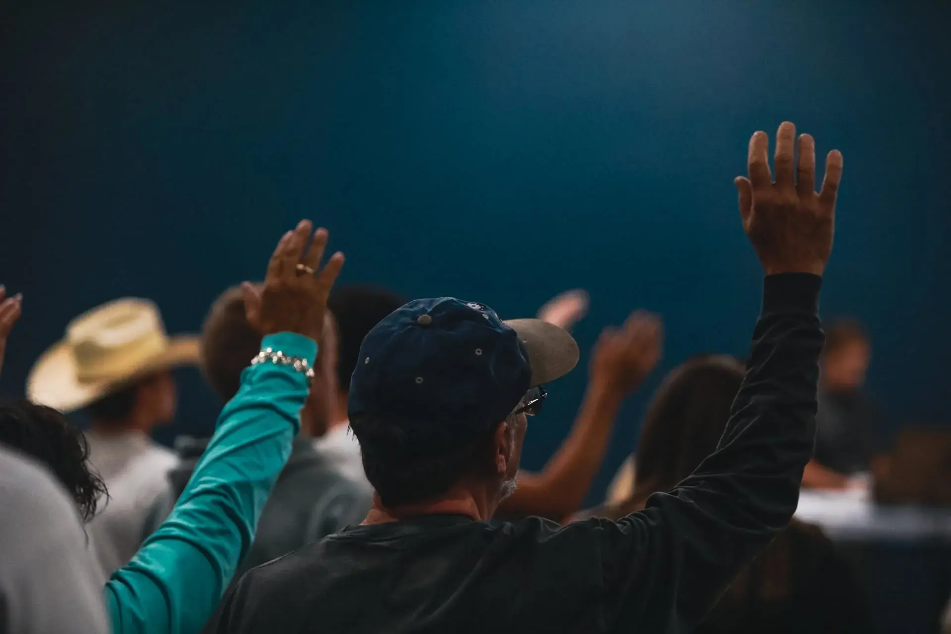 People worshiping together at Good News Co.